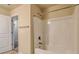 Bright bathroom featuring a clean, white bathtub and shower combination at 2513 Shropshire Pl, Mcdonough, GA 30253