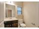 Bathroom featuring a window and a single sink at 2513 Shropshire Pl, Mcdonough, GA 30253
