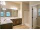 Bathroom featuring a large mirror and a shower stall at 2513 Shropshire Pl, Mcdonough, GA 30253