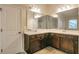 Bathroom vanity featuring dual sinks at 2513 Shropshire Pl, Mcdonough, GA 30253