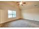 Bright bedroom featuring a vaulted ceiling and large window at 2513 Shropshire Pl, Mcdonough, GA 30253