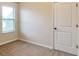 Cozy bedroom featuring a window providing natural light at 2513 Shropshire Pl, Mcdonough, GA 30253
