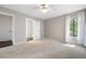 Bedroom with neutral carpet and walls, with view of an open en-suite bathroom at 4030 Muirfield Ln, Marietta, GA 30068