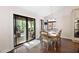 Dining room with wood floors and access to the backyard at 4030 Muirfield Ln, Marietta, GA 30068