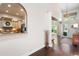 Inviting foyer with high ceilings, dark hardwood floors, and archway view into the kitchen at 4030 Muirfield Ln, Marietta, GA 30068