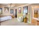 Inviting bedroom features a daybed, ample natural light, accent chair and artwork for a charming, cozy space at 4157 Town Branch Ct Sw, Covington, GA 30014