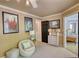 Hallway view showcases the neutral color palette and artwork for a seamless transition between spaces at 4157 Town Branch Ct Sw, Covington, GA 30014