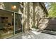 View of back patio including access to inside of home, offering outdoor relaxation space at 72 Ivy Ne Pkwy, Atlanta, GA 30342