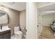Neat half-bathroom offering a vessel sink, modern faucet, and a convenient layout at 72 Ivy Ne Pkwy, Atlanta, GA 30342
