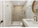 Bright bathroom features a glass enclosed shower and designer fixtures at 72 Ivy Ne Pkwy, Atlanta, GA 30342