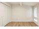 Bright bedroom with white trim, hard floors, and natural light at 72 Ivy Ne Pkwy, Atlanta, GA 30342