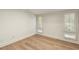 Clean bedroom with natural light filtering through shuttered windows at 72 Ivy Ne Pkwy, Atlanta, GA 30342
