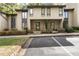 Two-story condos with well-maintained landscaping and ample parking at 72 Ivy Ne Pkwy, Atlanta, GA 30342