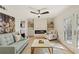 Comfortable living room with stylish fireplace, built-in shelves and plenty of natural light at 72 Ivy Ne Pkwy, Atlanta, GA 30342