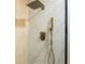 Contemporary shower with brass hardware, marble tile, and rainfall showerhead at 72 Ivy Ne Pkwy, Atlanta, GA 30342
