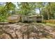 Large backyard with a wooden deck, perfect for entertaining and relaxing outdoors at 1545 Orlando Sw St, Atlanta, GA 30311
