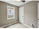Cozy bedroom featuring hardwood floors, a ceiling fan, and ample natural light at 1545 Orlando Sw St, Atlanta, GA 30311