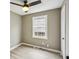 Comfortable bedroom featuring hardwood floors, a ceiling fan, and ample natural light at 1545 Orlando Sw St, Atlanta, GA 30311