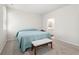 Cozy bedroom featuring neutral carpet, a comfortable bed, and access to an ensuite bathroom at 2617 Cacao Sq, Acworth, GA 30101