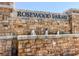 Stone monument sign for Rosewood Farms with decorative water features in the landscaping at 2617 Cacao Sq, Acworth, GA 30101