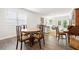 Inviting dining area with wood floors and natural light, perfect for Gathering meals at 2617 Cacao Sq, Acworth, GA 30101