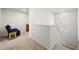 Upstairs hallway featuring a small seat and view to the bedroom at 2617 Cacao Sq, Acworth, GA 30101