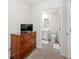 Hallway with a dresser and view to the bathroom at 2617 Cacao Sq, Acworth, GA 30101
