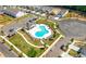 Aerial view of community pool and clubhouse with parking and lawn area at 2617 Cacao Sq, Acworth, GA 30101
