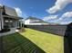 Spacious backyard with lush green grass and patio seating area provides a serene outdoor escape at 3220 Montebello Pkwy, Cumming, GA 30028