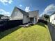 Beautifully landscaped backyard with black wooden fence for added privacy and room to play at 3220 Montebello Pkwy, Cumming, GA 30028