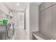 Functional laundry room equipped with modern washer/dryer and ample storage and organization solutions at 3220 Montebello Pkwy, Cumming, GA 30028