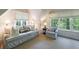 Comfortable attic room featuring a plush couch and chair near windows with natural light at 728 Wesley Nw Dr, Atlanta, GA 30305