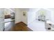 Cozy attic featuring hardwood floors and a charming play area, offering a versatile space for relaxation or play at 728 Wesley Nw Dr, Atlanta, GA 30305