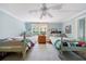 Comfortable bedroom with two beds, a dresser, and a ceiling fan at 728 Wesley Nw Dr, Atlanta, GA 30305