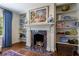 Close-up of a fireplace with custom shelving, showcasing elegant decor and architectural details at 728 Wesley Nw Dr, Atlanta, GA 30305