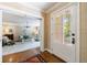 Welcoming foyer featuring hardwood floors and an entryway into a cozy living room at 728 Wesley Nw Dr, Atlanta, GA 30305