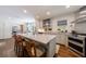 Modern kitchen with a spacious island, stainless steel appliances, and stylish finishes for a gourmet cooking experience at 728 Wesley Nw Dr, Atlanta, GA 30305