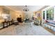 Inviting living room with large windows, neutral walls, and stylish decor at 728 Wesley Nw Dr, Atlanta, GA 30305