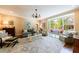 Cozy living room featuring comfortable seating and abundant natural light at 728 Wesley Nw Dr, Atlanta, GA 30305