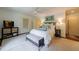 Comfortable main bedroom with plush bedding, a ceiling fan, and abundant closet space at 728 Wesley Nw Dr, Atlanta, GA 30305
