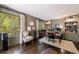 Bright home office featuring hardwood floors, a seating area, and custom built-in bookshelves at 728 Wesley Nw Dr, Atlanta, GA 30305