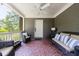 Cozy porch featuring stylish furnishings and a welcoming entrance, perfect for relaxing and entertaining guests at 728 Wesley Nw Dr, Atlanta, GA 30305