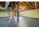 Spacious unfinished basement featuring a painted cement floor, and exposed ductwork at 1697 Ramblewood Way, Snellville, GA 30078