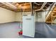 Close-up of dehumidifier in unfinished basement with exposed ductwork and stair access at 1697 Ramblewood Way, Snellville, GA 30078