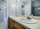 Bathroom featuring double sinks and walk-in shower at 1697 Ramblewood Way, Snellville, GA 30078