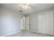 This bedroom includes closet and an entrance to another room at 1697 Ramblewood Way, Snellville, GA 30078