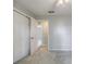 The bedroom has carpet flooring and double door closet at 1697 Ramblewood Way, Snellville, GA 30078