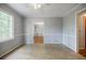 Bright dining room with large window and neutral color palette, perfect for gatherings and entertaining at 1697 Ramblewood Way, Snellville, GA 30078