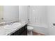 Bathroom featuring granite countertops and tub/shower combination at 2075 Villa Spring Ct, Dacula, GA 30019