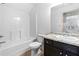 Bathroom featuring a shower-tub combo, toilet, and sink with granite counters at 2075 Villa Spring Ct, Dacula, GA 30019